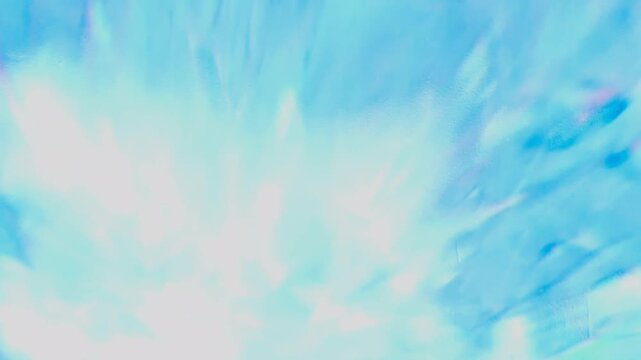 ethereal pastel blue tie dye fabric texture ripples with soft light in a dreamlike wellness background