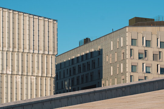 Minimal Oslo Norway architecture building skyline with office concrete forms and clear copy space on clean daylight background for branding layouts