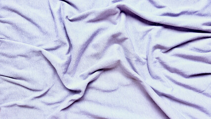 Fototapeta premium soft rumpled lavender jersey fabric texture displays natural organic wrinkles perfect for sustainable fashion background