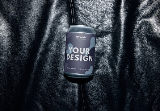 Mockup Of Customizable 33Cl Drinks Can On Leather