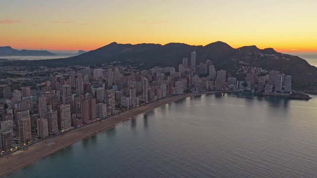 Aerial sunrise over benidorm spain cityscape