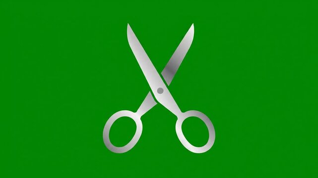 A pair of silver scissors crossed against a green background in a video