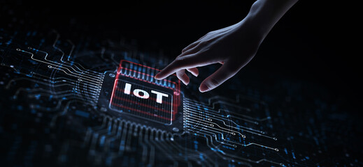 IoT Connecting Devices for Smarter Living Illustrated on a Processor Touched by a Human Hand. © WrightStudio