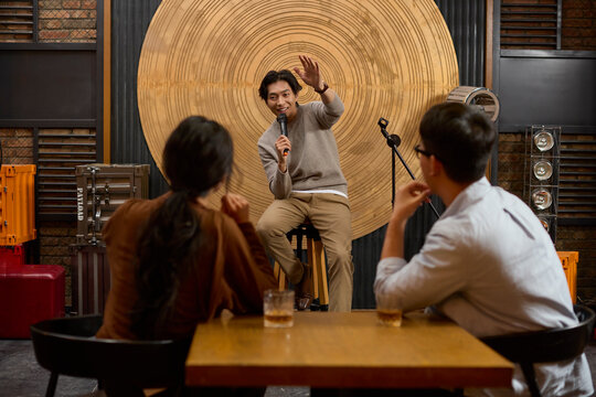 Young professionals let loose and enjoy a night of singing and laughter