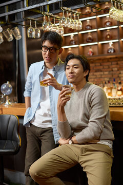 After a long day at work, the team hits the bar to unwind