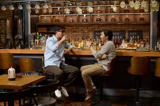 After a long day at work, the team hits the bar to unwind