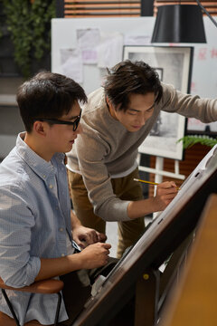 The team works late into the evening to meet a deadline