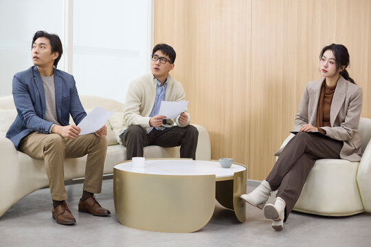 Applicants wait nervously for their interview to start