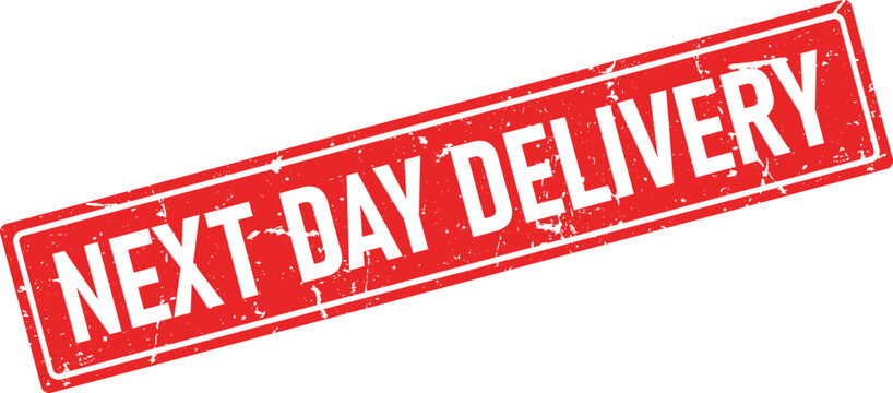Red rectangular rubber stamp with NEXT DAY DELIVERY text in a bold distressed white font