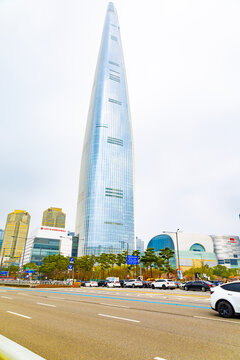Lotte World Tower skyscraper with city road traffic in Seoul South Korea urban scene