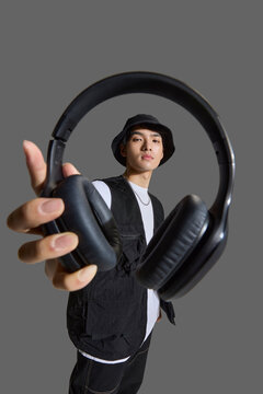 Cool and chic young man with headphones