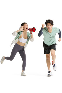 A girlfriend cheering on her boyfriend as he runs
