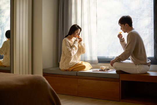 Young couple sharing a perfect moment over tea