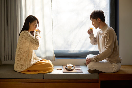 Young couple sharing a perfect moment over tea
