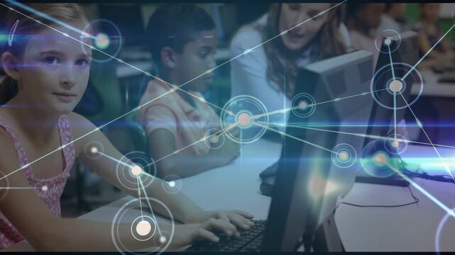Left girl typing as teacher leaning to right boy, network emerging overlaying monitors aiding study