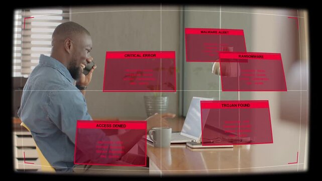 Remote worker talking on smartphone, reacting to security HUD warnings over laptop and tapping keys