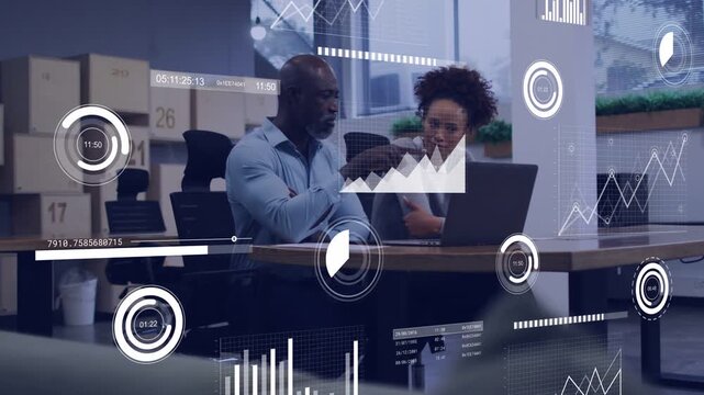 Manager pointing at laptop, showing analyst business data as animated charts updating for planning