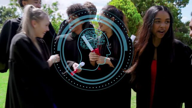 Grads stepping in on grass swapping diplomas hugging, graduating, blue overlay animating over group