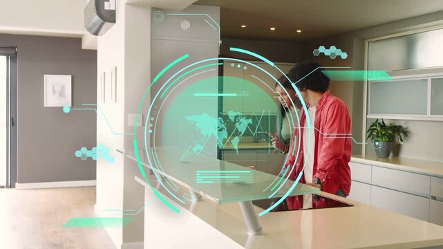 Woman tapping phone, man moving mug at island, transparent home tech HUD marking items to sort