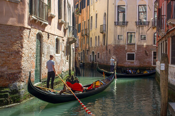 Traditional gondola ride on the narrow water canal - Venice, Italy © Miroslawa Drozdowski