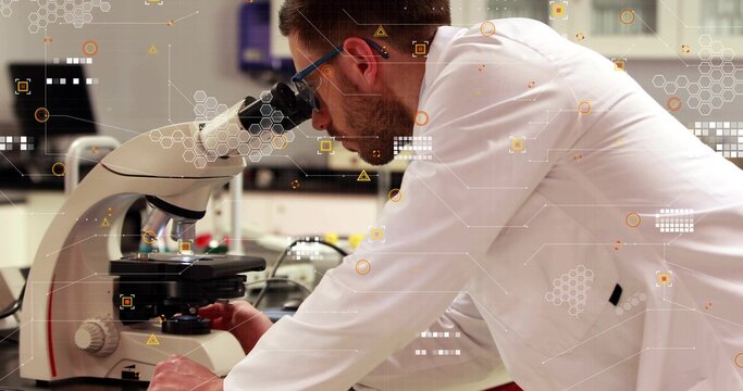 Leaning scientist in white coat blue goggles adjusting microscope stage at lab bench with HUD