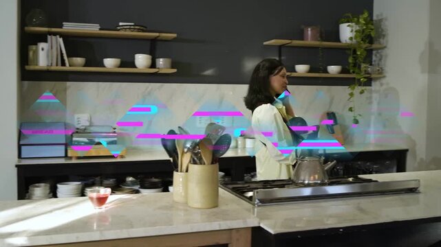 Mother answering phone and moving through kitchen, juggling call and parenting, glitch overlaying