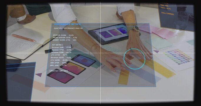 Pointing three women in business attire reviewing mockups and swatches in office, with tablets HUD
