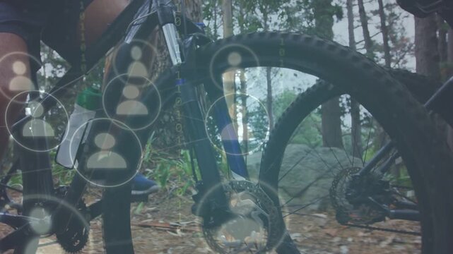 Camera pulling back, riders pausing while tech avatars and binary digits floating over bikes