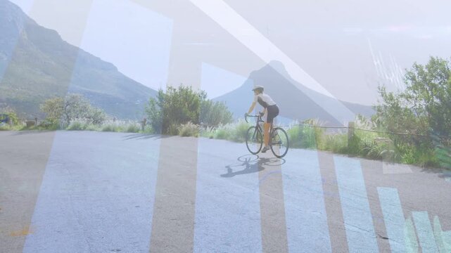 Woman cyclist pedaling mountain rd, shifting toward aero training while graphic bars showing motion