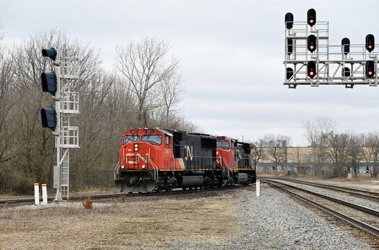 After uncoupling from their train, Canadian National Railway locomotives make a switching move on a wye track as they move to back into a local yard to pick up several freight cars.