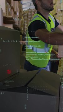Vertical video: WHS packer opening bay lifting boxes for orders woman using tablet code over crew