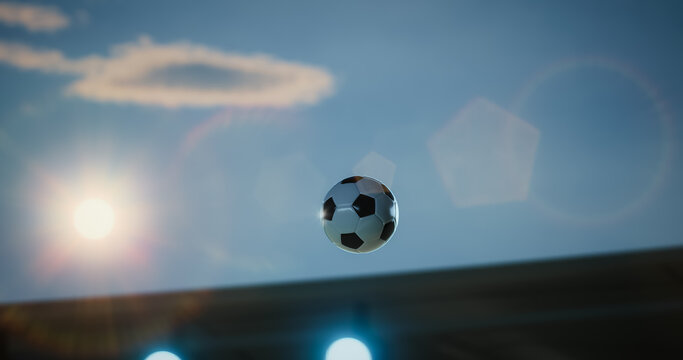 Football Championship Ball Flies Through the Air Above the Stadium in a Decisive Goal Moment, Lit by Bright Sun and Arena Lights, Capturing Speed, Victory, Win, Action, and Tournament Intensity.
