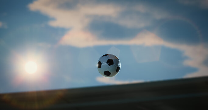 Football Championship Ball Flies Through the Air Above the Pitch in a Decisive Goal Moment, Glowing in Bright Sunset Light and Cloud Haze, Capturing Speed, Victory, Win, and High-stakes Match Action.