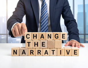 Obraz premium Change the narrative - Geschäftsmann zeigt auf das Wort 