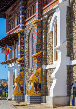 SAPANTA, MARAMURES, ROMANIA-SEPTEMBER 18, 2020: Church in the Merry Cemetery, famous in the world for its colourful wood tombstones, with naive paintings describing the people who are buried there