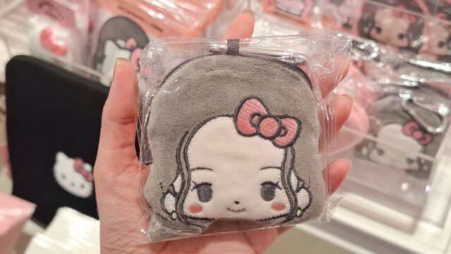 Sanrio Hello Kitty merchandise from the exclusive Jisoo Blackpink collaboration featuring a plush character coin purse and themed accessories on April 18, 2026 in Bangkok, Thailand