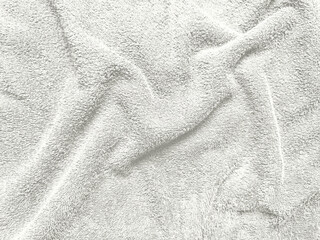 Fototapeta premium white fluffy terry cloth texture close up with gentle folds and soft loops evoking luxurious spa serenity and cozy comfort background