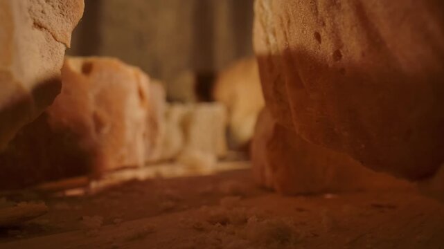 Detailed macro view of white bread crumb showing porous airy texture and crispy crust. Concept of homemade food, bakery products, bakeries and bread factories, market, gastronomy and culinary art