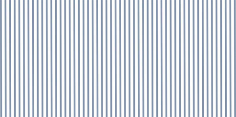 Obraz premium Seamless blue and white vertical stripes pattern. Minimalist ticking fabric texture for farmhouse interior, nautical wallpaper, and elegant linear background. Clean straight lines design.