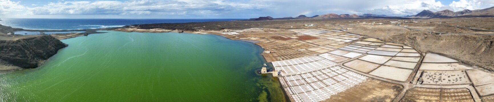 Salt mining plant, Salinas de Janubio with green Laguna de Janubio, near Yaiza, aerial view, Lanzarote, Canary Islands, Spain