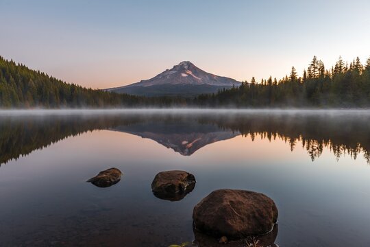 Sunrise, reflection of the volcano Mt. Hood in Lake Trillium Lake, Oregon, USA