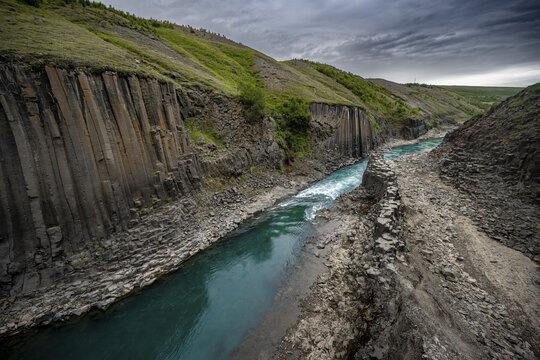 Stu&eth;lagil Canyon, turquoise river between basalt columns, Egilsstadir, Iceland