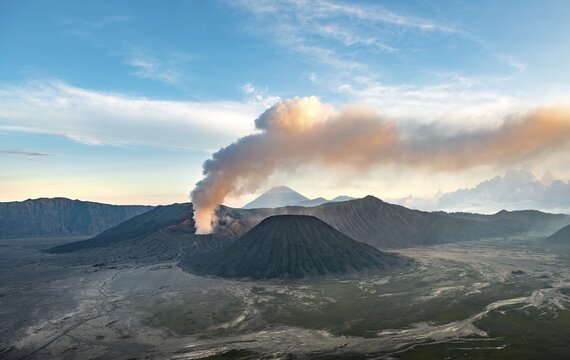View of volcanoes at sunset, smoking volcano Gunung Bromo, Batok, Mt. Kursi, Gunung Semeru, National Park Bromo-Tengger-Semeru, Java, Indonesia