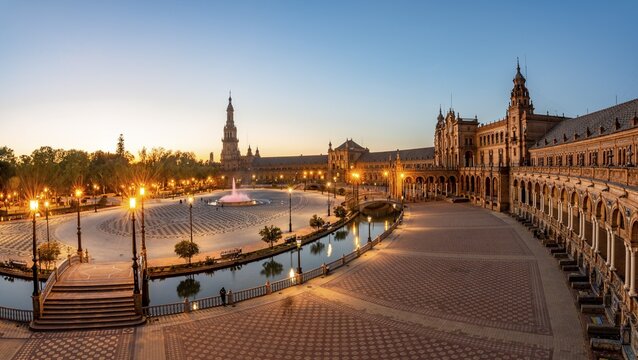 View over the illuminated Plaza de Espa&ntilde;a at evening light, Sevilla, Andalusia, Spain