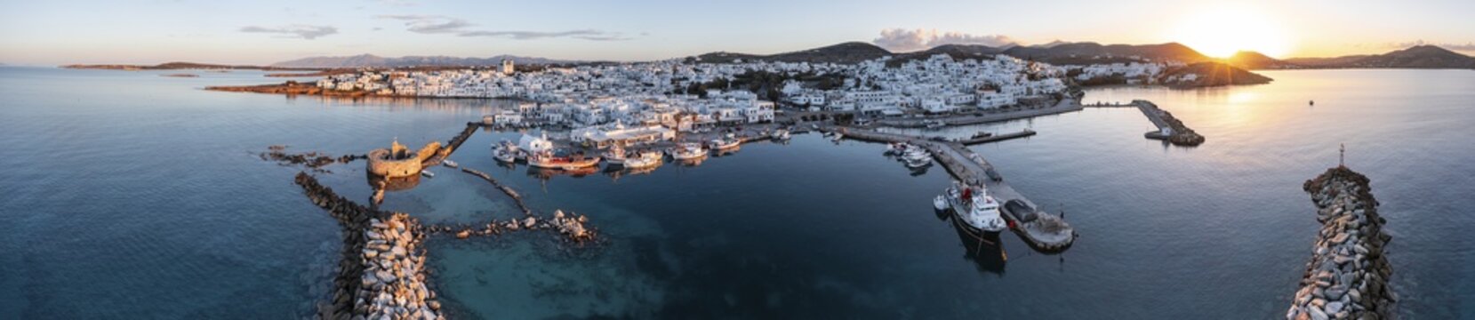 Evening atmosphere, aerial view, town view and harbour of Naoussa, harbour wall with Venetian ruins, Paros, Cyclades, Greece