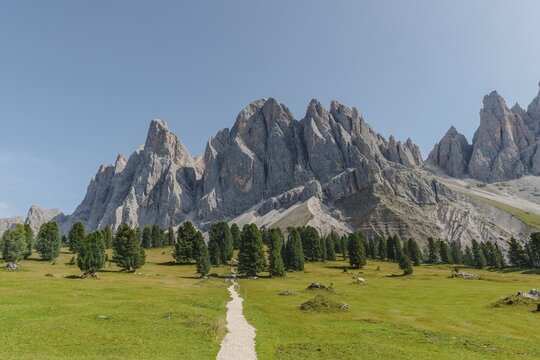 Hiking trail near the Gschnagenhardt Alm, Villn&ouml;&szlig; valley below the Geisler Peaks, behind the Geisler Group, Sass Rigais, Dolomites, South Tyrol, Italy
