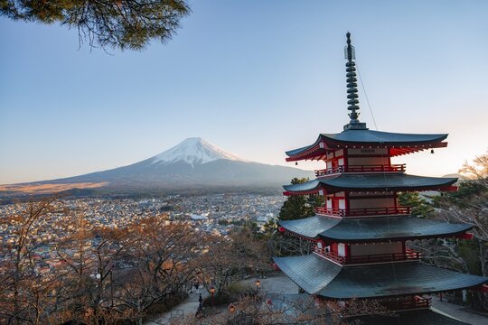 Five-story pagoda of a Shinto Shrine, Chureito Pagoda, with views of Fujiyoshida City and Mount Fuji volcano at sunset, Arakura Fuji Sengen Shrine, Arakurayama Sengen Park, Yamanashi Prefecture, Japan