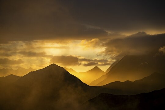 Montafon mountains with dramatic cloudy sky at sunset, Tschagguns, R&auml;tikon, Montafon, Vorarlberg, Austria