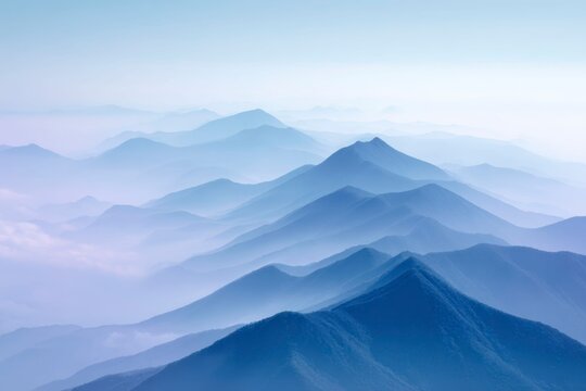 the majestic mountains in blue tones, the mountain range stretches across the horizon with sharp peaks and soft slopes