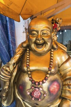 Big Golden Buddha by a road, Chinatown, Singapore